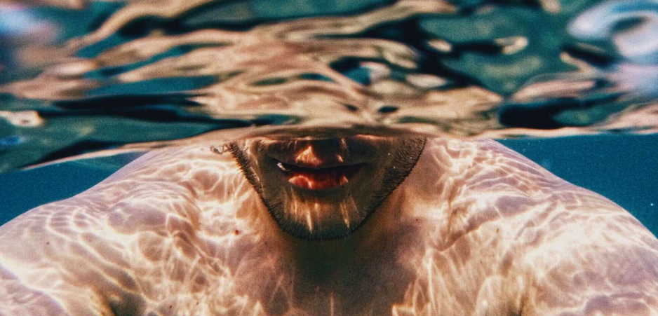 Woman visualizing positive energy during shower